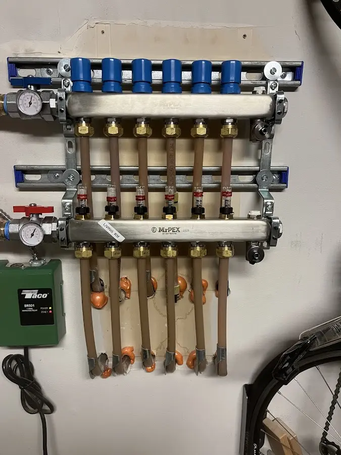 Plumber performing Water Heater Repair at a residential property in Saugus